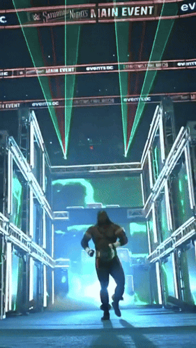 Man Running Through Tunnel Saying Saturday Nights Main Event