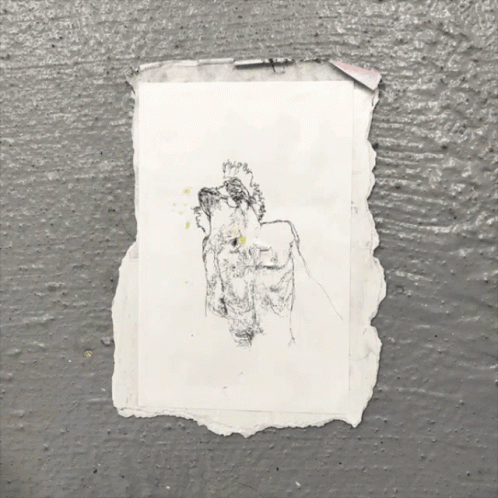 Man's Back on Torn Paper