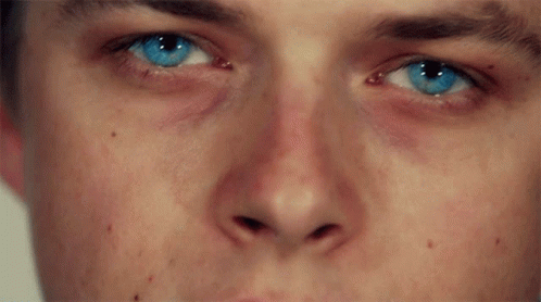 Man's Blue Eyes Close Up