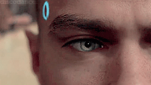 Man's Eye Close Up Blue Circle on Forehead