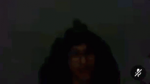 Man's Eye With Glasses in Dark