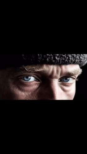 Man's Eyes Close Up with Hat