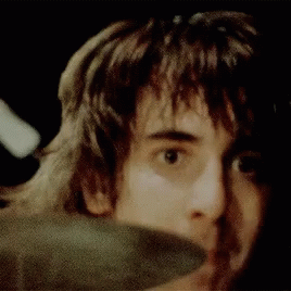 Man's Face Close Up Black Background GIF