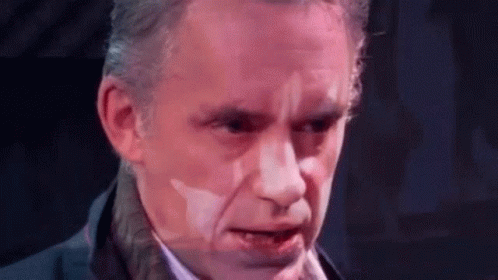 Man's Face Close Up Purple Background GIF
