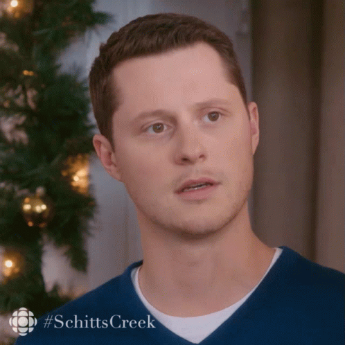 Man's Face Close Up With Schitts Creek GIF