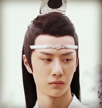 Man's Face Close Up With White Headband GIF