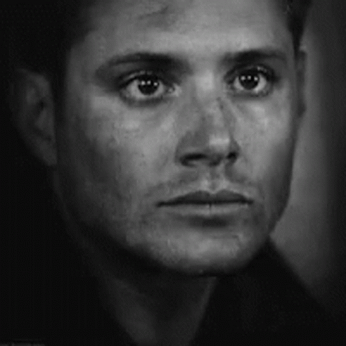 Man's Face in Black and White Photo