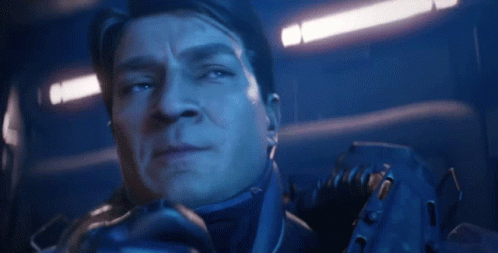 Man's Face In Blue Light GIF