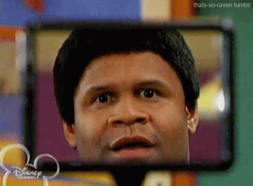 Man's Face In Disney Rear View Mirror GIF