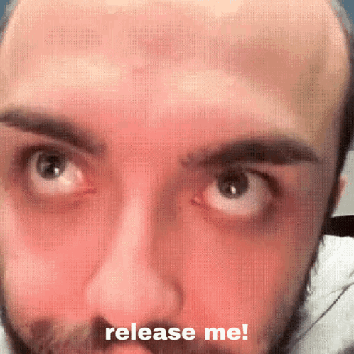 Man's Face Saying Release Me