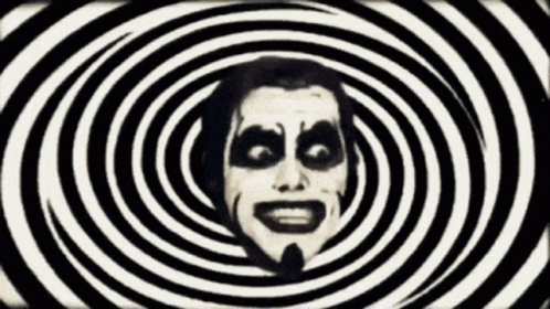 Man's Face Surrounded by Hypnotic Spirals