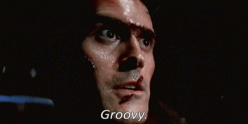 Man's Face With Blood and Groovy Text