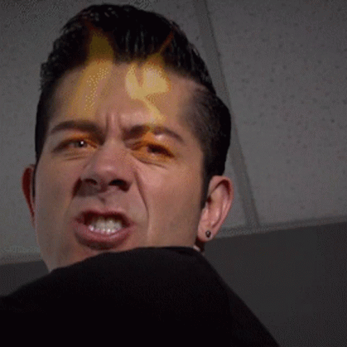 Man's Face With Flame Out Of Forehead GIF
