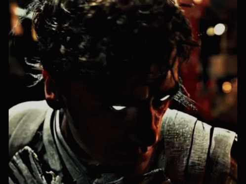 Man's Face With Light From Eyes GIF