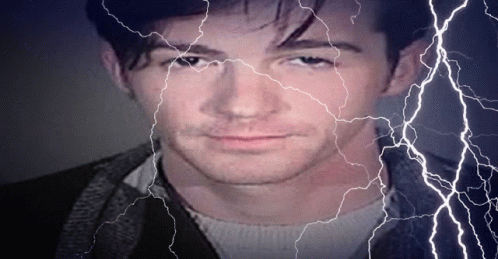 Man's Face With Lightning Behind GIF