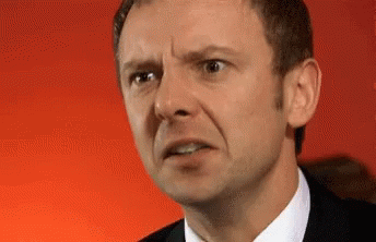 Man's Face With Red Background GIF
