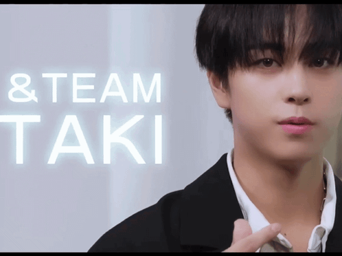 Man's Face with Team Taki Text