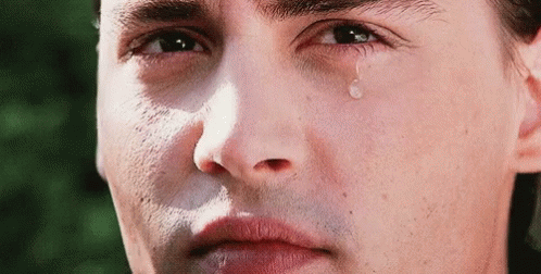 Man's Face With Tear GIF