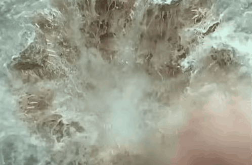 Man's Face With Water Spraying