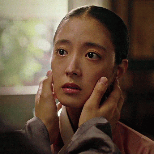 Man's Hands On Woman's Face GIF