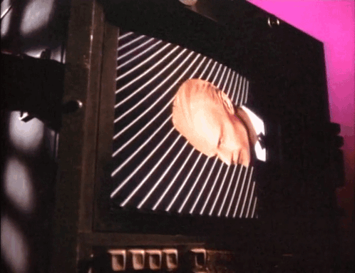 Man's Head With Striped Pattern GIF