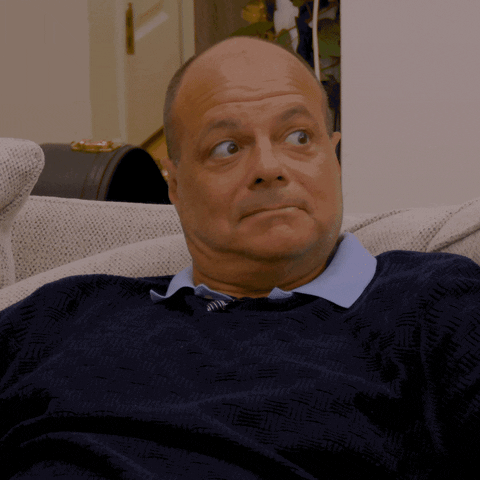 Man's Oop Moment While Relaxing On Couch GIF