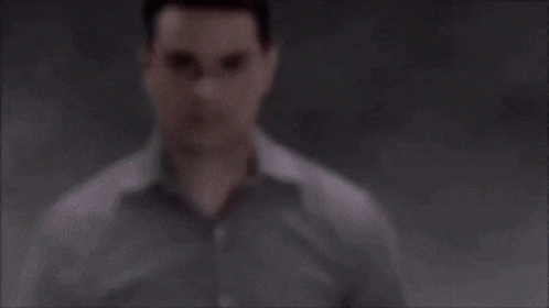 Man's Serious Face Close Up GIF