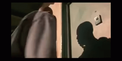 Man's Shadow on Door