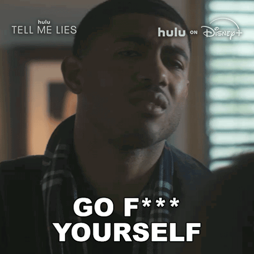 Man Saying Go F Yourself In Front Of Disney Poster GIF