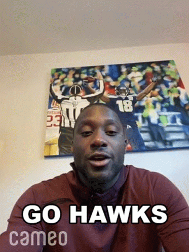 Man Saying Go Hawks In Front Of Football Painting GIF