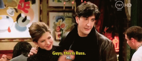Man Saying Guys This Is Russ Hi Standing Next To Woman GIF