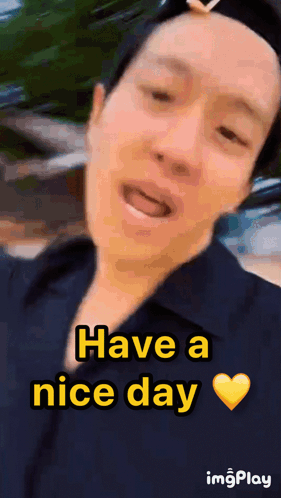 Man Saying Have a Nice Day Yellow Heart
