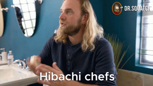 Man Saying Hibachi Chefs Blue Wall