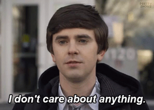 Man Saying I Don't Care About Anything in Front of Building