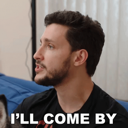 Man Saying 'I'll Come By' in Black Shirt