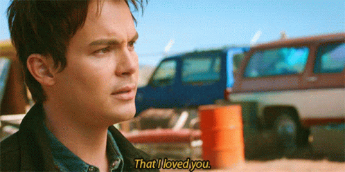 Man Saying I Loved You in Front of Cars