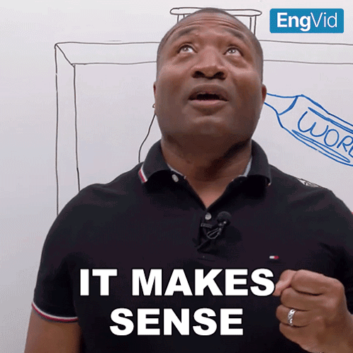 Man Saying It Makes Sense in Front of White Board