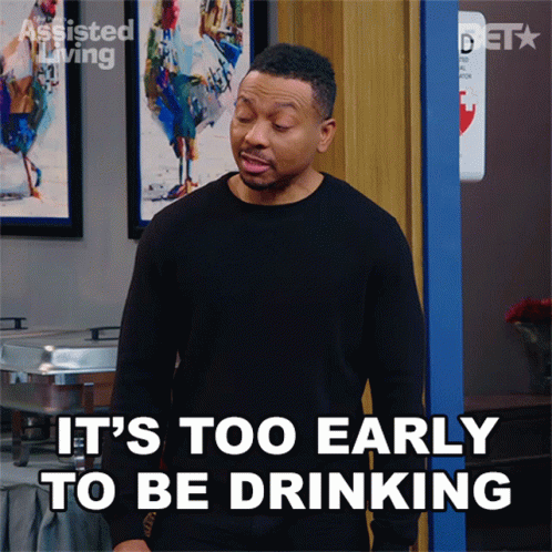 Man Saying It's Too Early to Be Drinking at Buffet