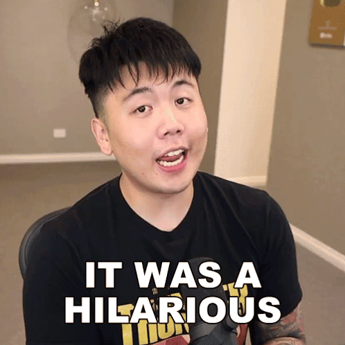 Man Saying It Was Hilarious in Black Shirt