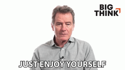 Man Saying Just Enjoy Yourself In Front Of Big Think Ad GIF
