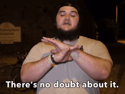 Man Saying No Doubt in Front of Sign