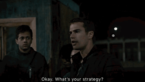Man Saying Okay Whats Your Strategy to Two People