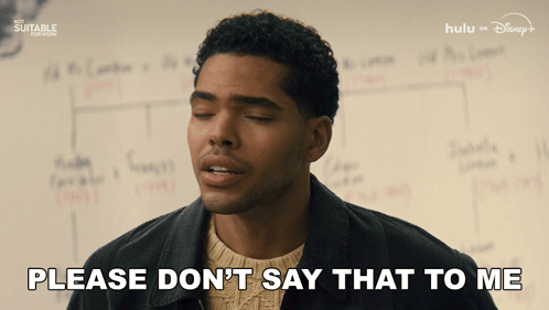 Man Saying Please Don't Say That to Me in Front of Whiteboard