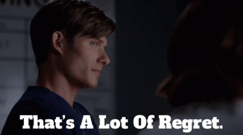 Man Saying That's A Lot Of Regret In Dark Room GIF