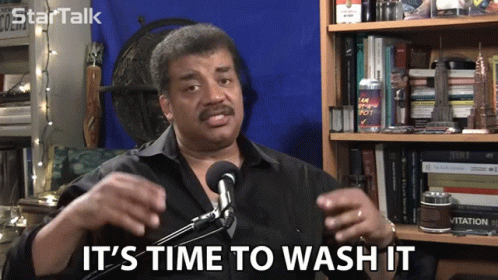 Man Saying Time to Wash It at Microphone