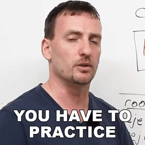 Man Saying You Have to Practice in Front of Whiteboard