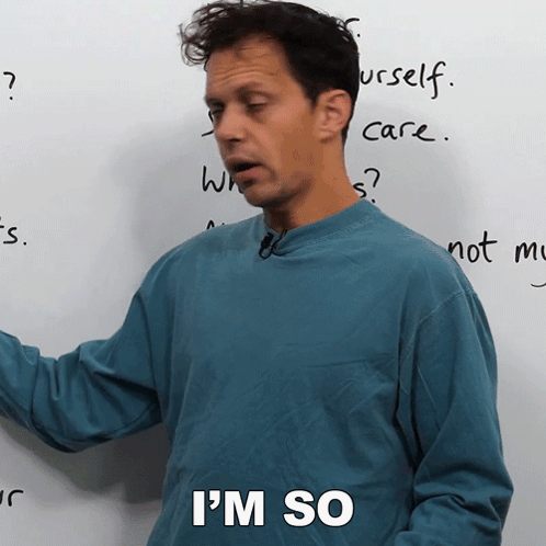 Man Says I'm So in Front of White Board