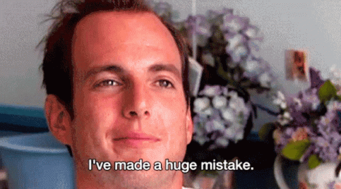 Man Says I've Made a Huge Mistake in Front of Flowers