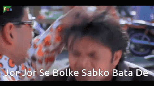 Man Scratching Another Man's Head Saying Jor Jor Se Bolke Sabko Bata De