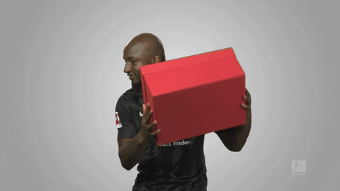 Man Shaking Gift GIF